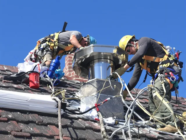 Protective chimney cap installed by Bedford Chimney Sweep in Bedford, MA