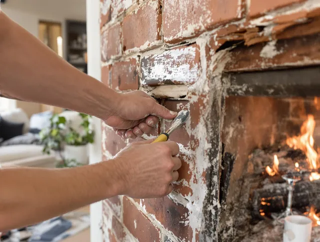 Routine fireplace repair by Bedford Chimney Sweep in Bedford, MA